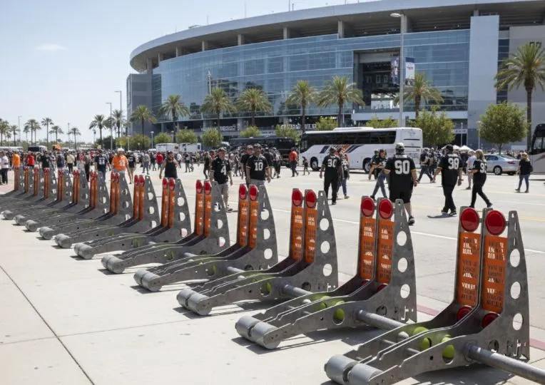 Portable vehicle barriers protecting a stadium perimeter